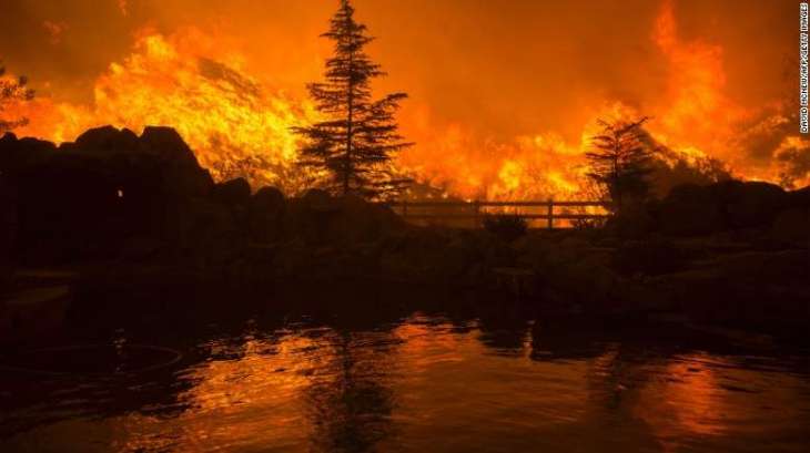 California forest fire, killing one person, destroyed 20 houses