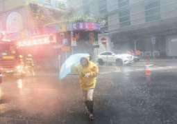 Hong Kong engulfed in storm