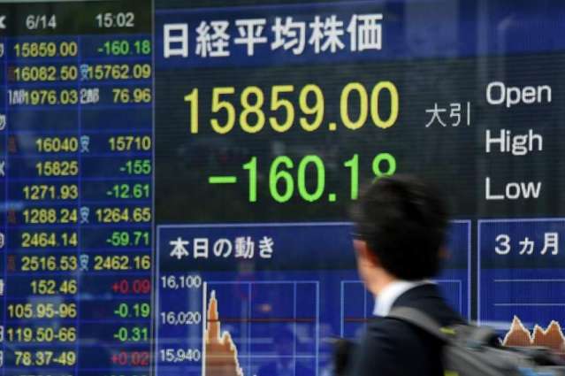 Tokyo stocks open lower after BoJ underwhelms