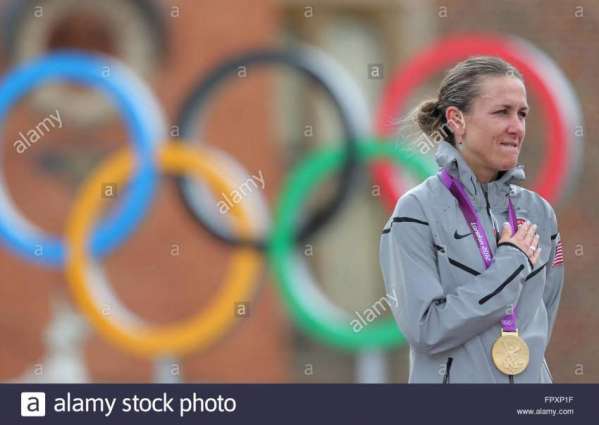 Olympics: women's cycling road trial podium