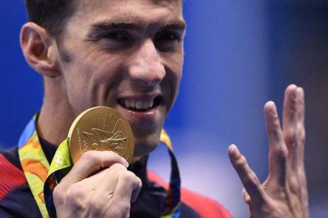 Olympics: Phelps triumphs again as first major doping cases revealed