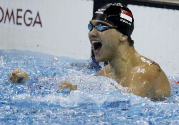 Olympics: Schooling upsets Phelps to win Singapore's first ever gold