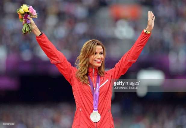 Olympics: Women's athletics 3000m steeplechase podium
