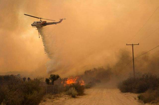 Firenadoes rage in California as blaze menaces 82,000