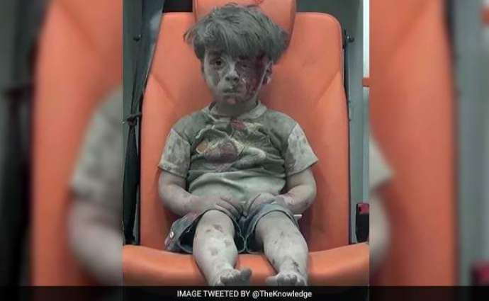 Russia denies its strikes hit Syrian boy in photo