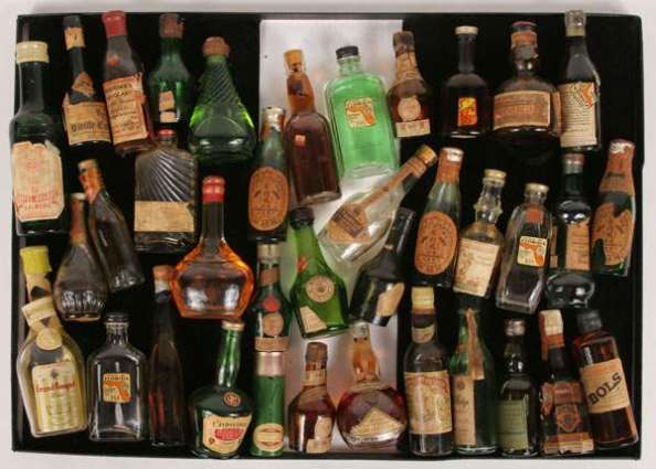 Two held, 67 liters liquor seized