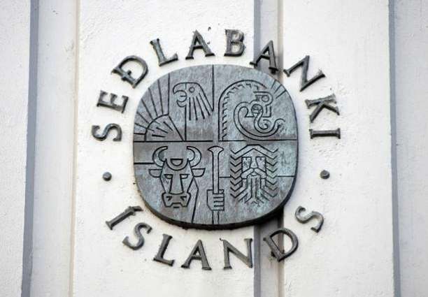 Iceland central bank cuts interest rates by half a point