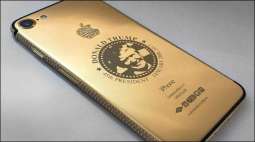 here comes gold Iphone 7 attributed to the new US president Donald trump with his picture on the back