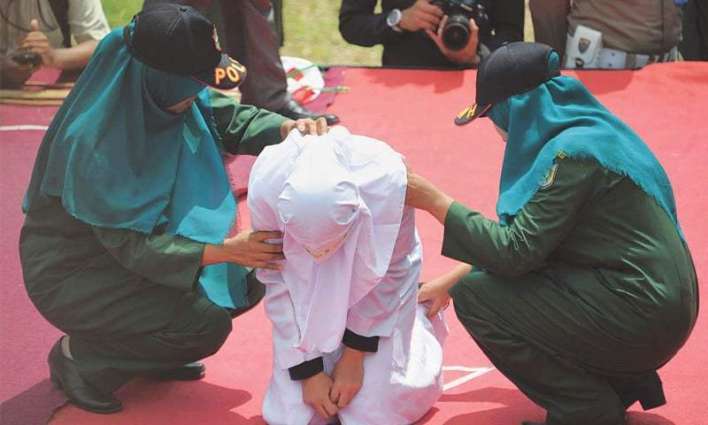 Couples, sex workers whipped in Indonesia's Aceh for breaking Islamic law