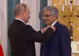            الرئيس التنفيذي لشركة ممتلكات البحرين القابضة أول بحريني يتسلم وسام الصداقة من قبل الرئيس الروسي بوتين          