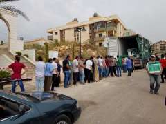 مركز الملك سلمان للإغاثة يوزع السلال الرمضانية للاجئين السوريين في منطقة عرمون في جبل لبنان