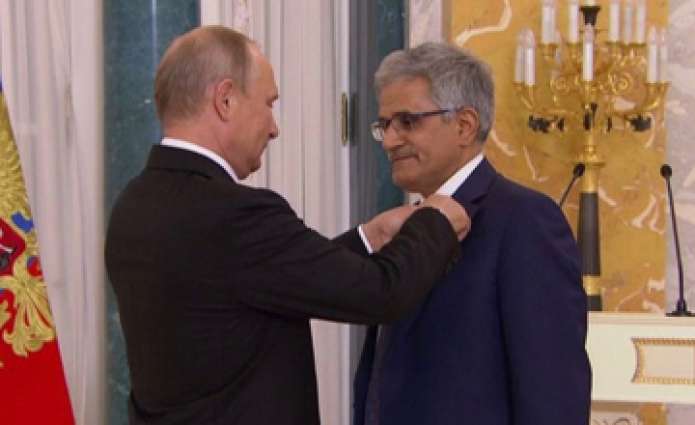            الرئيس التنفيذي لشركة ممتلكات البحرين القابضة أول بحريني يتسلم وسام الصداقة من قبل الرئيس الروسي بوتين          