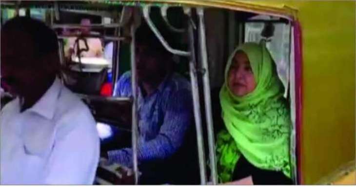 Woman candidate from NA-170 running election campaign on rickshaw