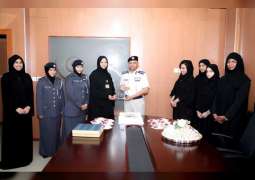 شرطة أبوظبي تحتفل بـ " يوم المرأة الإماراتية " 