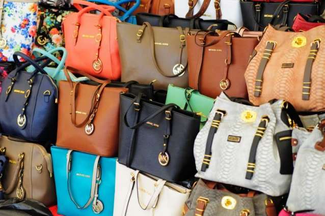 US Charges 22 for Allegedly Smuggling Fake Luxury Goods From China - Justice Dept.