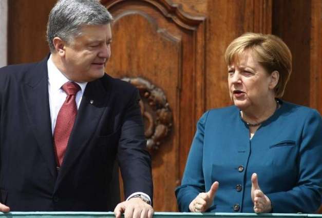 Poroshenko, Merkel Agree on Normandy Format Ministerial Consultations on Peacekeepers