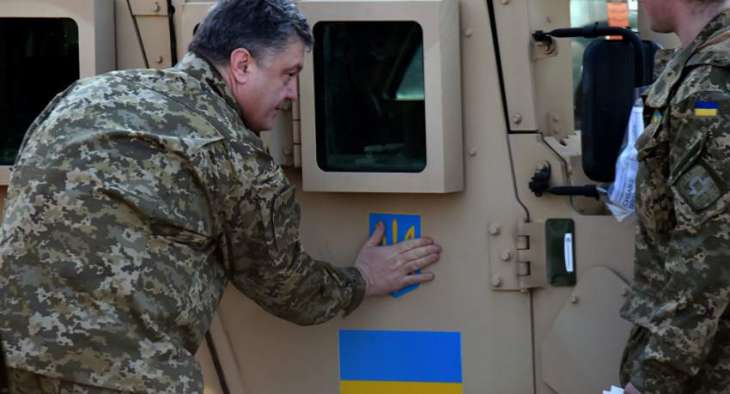 Poroshenko Pledges to Not Introduce Martial Law in Donbas Following Death of DPR Leader