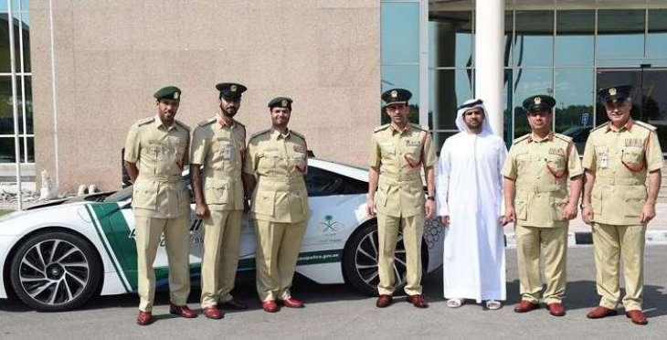 شرطة دبي تشارك السعودية احتفالاتها باليوم الوطني الـ 88