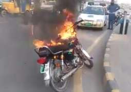 Citizen protests helmet challan by setting motorcycle on fire