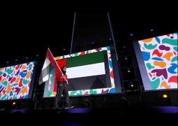 Al Mazmi holds UAE flag during Youth Olympic Games ceremony