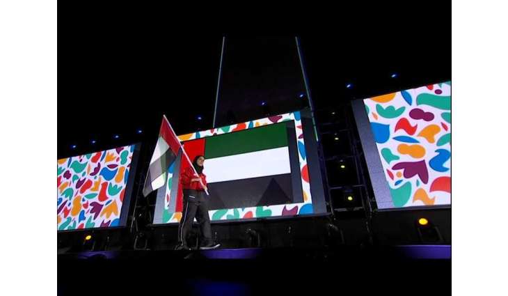 Al Mazmi holds UAE flag during Youth Olympic Games ceremony
