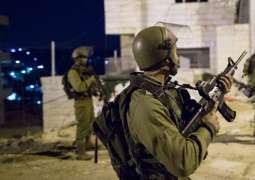 Israeli forces arrest 13 Palestinians in West Bank