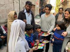 Ali Zafar visits his charity school with wife