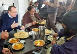 German envoy visits shelter home, shares a meal with homeless   