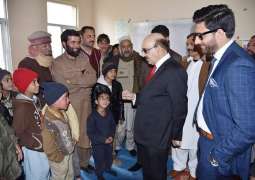 President Masood visits LoC, interacts victims of Indian shelling affectees