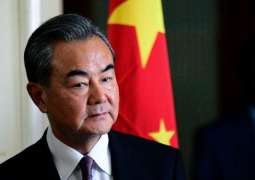Chinese Foreign Minister Wang Yi  Points to Political Pressure on IT Company Huawei