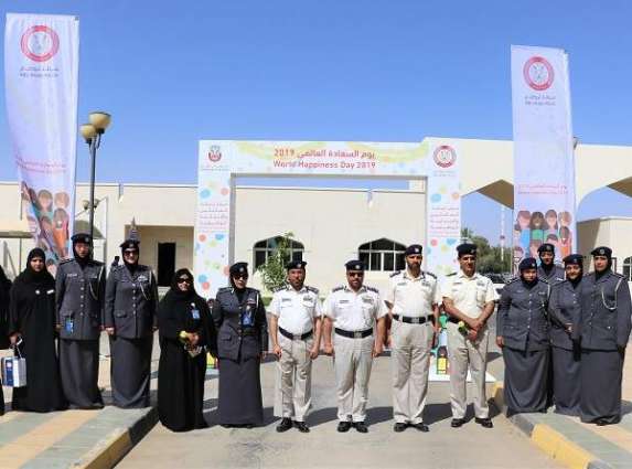 شرطة أبو ظبي تحتفل باليوم الدولي للسعادة