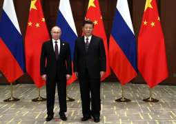 Russian, Chinese Presidents Exchange Gifts Following Talks in Beijing