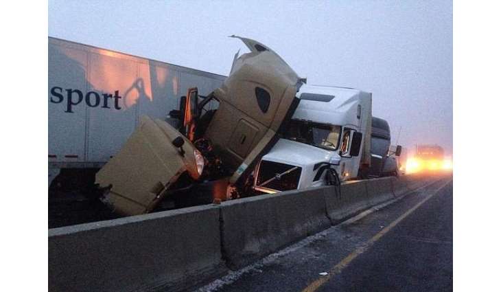 8 killed, more than dozen injured in head on collision between truck and passenger van