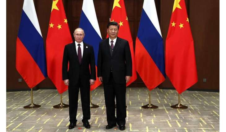 Russian, Chinese Presidents Exchange Gifts Following Talks in Beijing