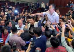 Hong Kong lawmakers fight over extradition law