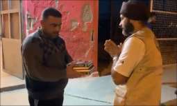 Sikhs win over hearts by distributing Quran copies at refugee camp