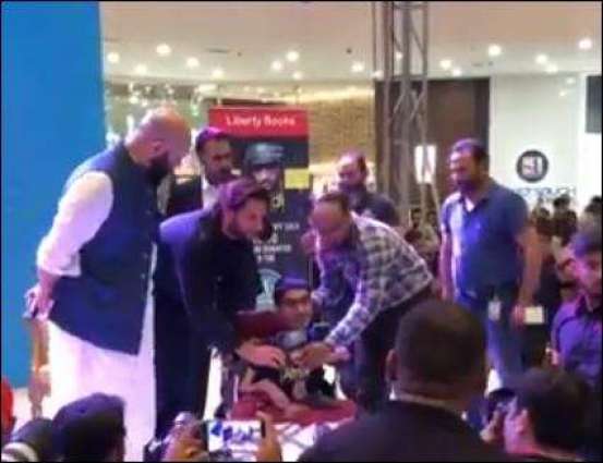 Shahid Afridi shares first copy of ‘Game Changer’ with a special fan