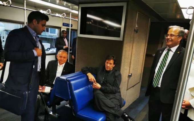 PM Imran takes local bus to airport, pictures go viral