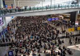Hong Kong Protesters Defend Airport Chaos
