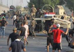 Thousands in bloody protests across Iraq, 30 dead