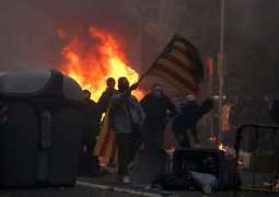 Violence escalates in Barcelona after 500,000 separatists rally