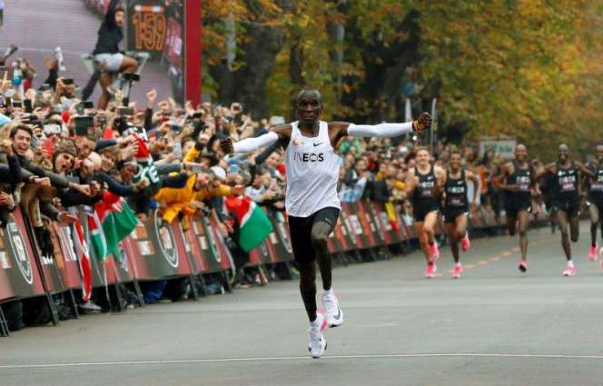 Kenyan Runner Kipchoge Sets World Record by Breaking Two-Hour Marathon Barrier
