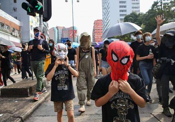 Tensions Heat Up in Hong Kong as Halloween Protesters Set Fire to Barricades