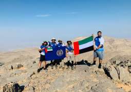 فريق شرطة أبوظبي للمغامرات يرفع علم الإمارات على (7) قمم جبلية