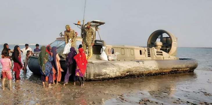 Pakistan Navy Distributes Ration In Sea Cyclone ‘Kyarr’ Affected areas Of Keti Bandar, Thatta