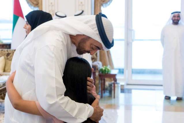 Mohamed bin Zayed meets children of martyrs