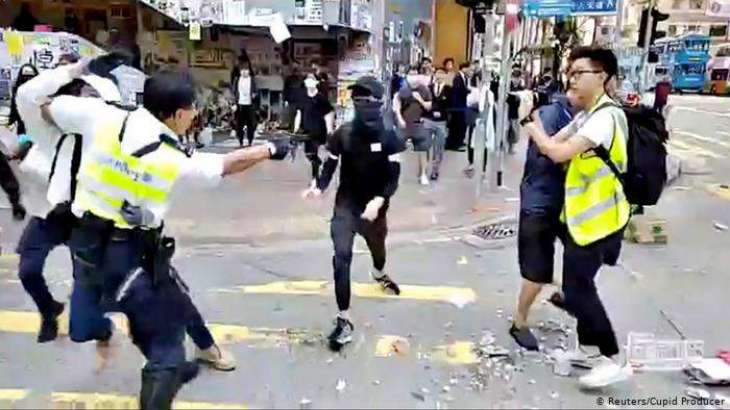 Hong Kong police shoot man in day of violence and chaos