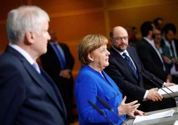 Germany's Next Social Democrat Co-Leaders Say Won't Immediately Disband Coalition