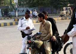 Pillion riding allowed, one-wheeling banned in Karachi on New Year Eve