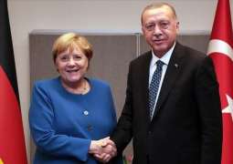 Erdogan, Merkel Conduct Phone Call Over Situation in Libya, Syria - Source